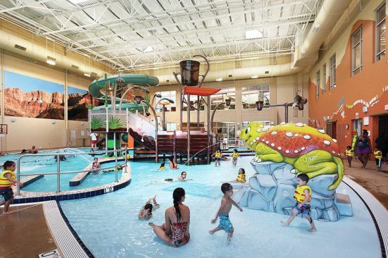 The giant, vibrantly colored horny toad visually anchors the zero-depth-entry children’s pool and provides fun by spouting an intermittent stream of water while doubling as a children’s slide. A 170-foot-long waterslide mark the highlights, but amenities also include a 4,257-sq.-ft. leisure pool, current channel, body slide, raft slide, interactive play structure, various interactive play features, kiddie slide, water basketball, water volleyball, and 195-sq.-ft. whirlpool.