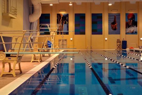 The aquatic center includes

a number of sustainable design features. The building was oriented

to capture natural daylight and reduce the required amount of

cutting and filling of soil. Inside, the pool dehumidification

system is designed to work with Colorado’s high altitude and

dry outside air, dehumidifying the space without the need for

excessive energy expenditure. Further energy-efficient features

include: high-performance windows; UV light and regenerative media

filtration.